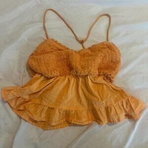 Orange ruffle crop top with